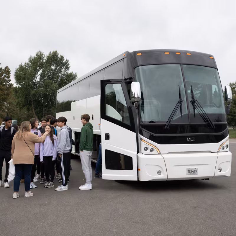 Black Mercedes Sprinter van staged for an Irving School Transportation group