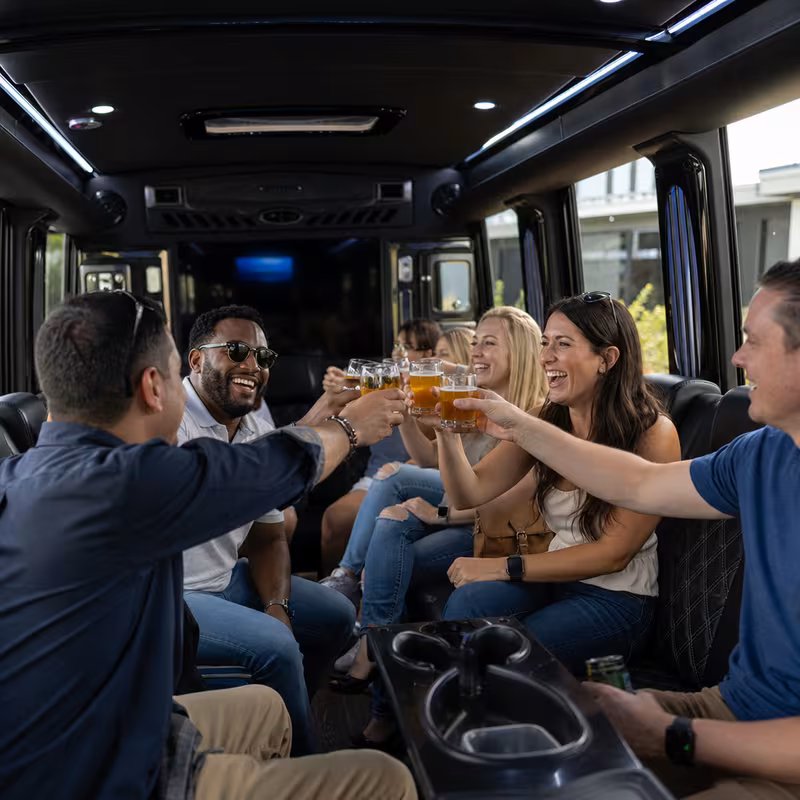 Black Mercedes Sprinter van staged for an Irving Winery & Brewery Tour Transportation group